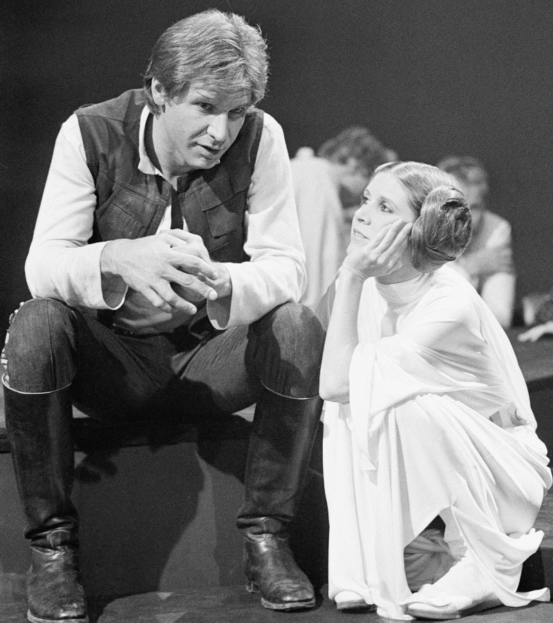 Ford and Fisher on the set of Star Wars, 1978. Image via AP.